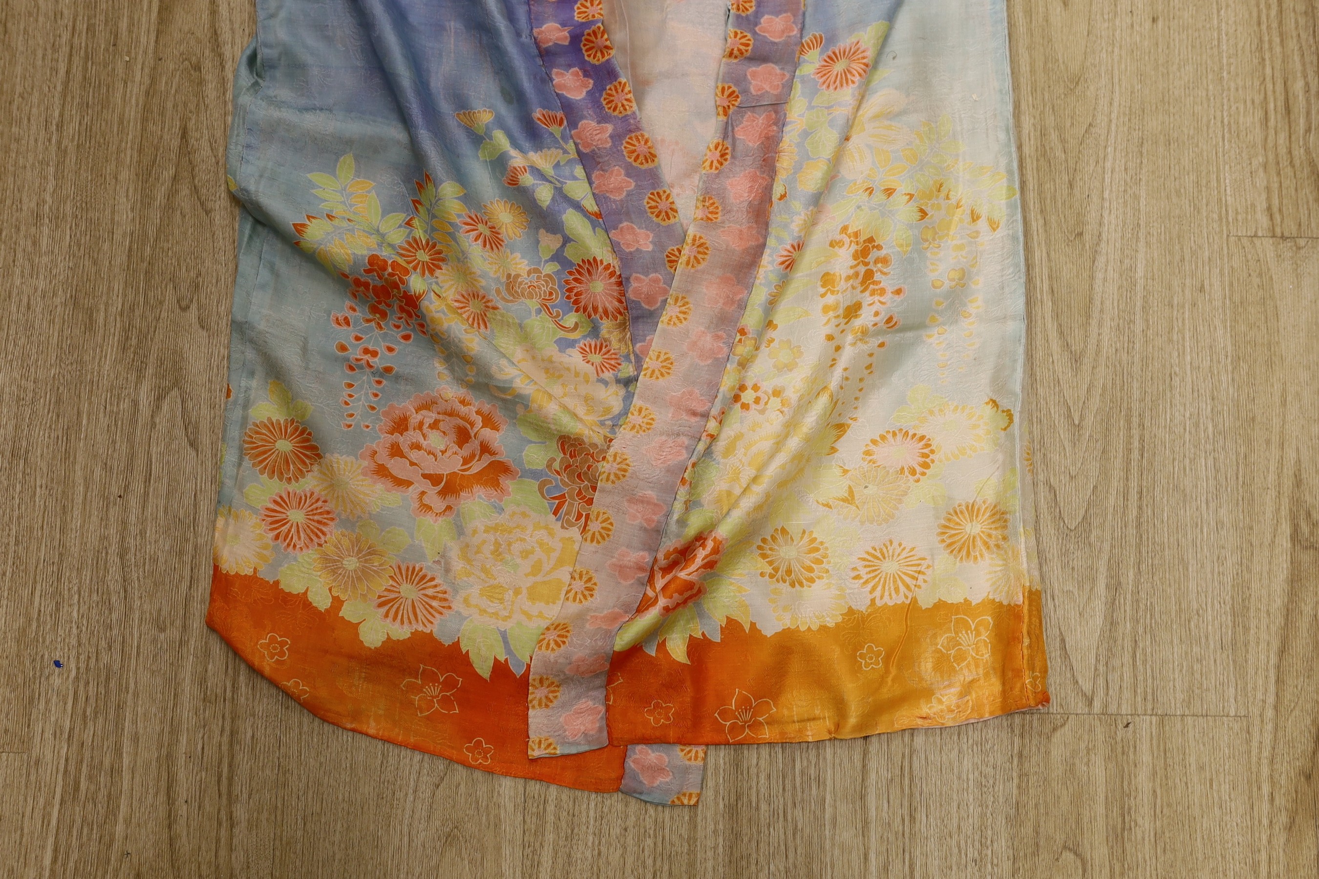 A Japanese navy blue silk kimono and another multi coloured silk ,patterned kimono from the 1930’s